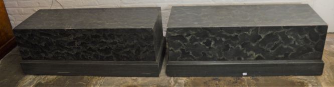 Pair of marbleized wooden plinths each 129cm by 50cm with a Ht of 47cm