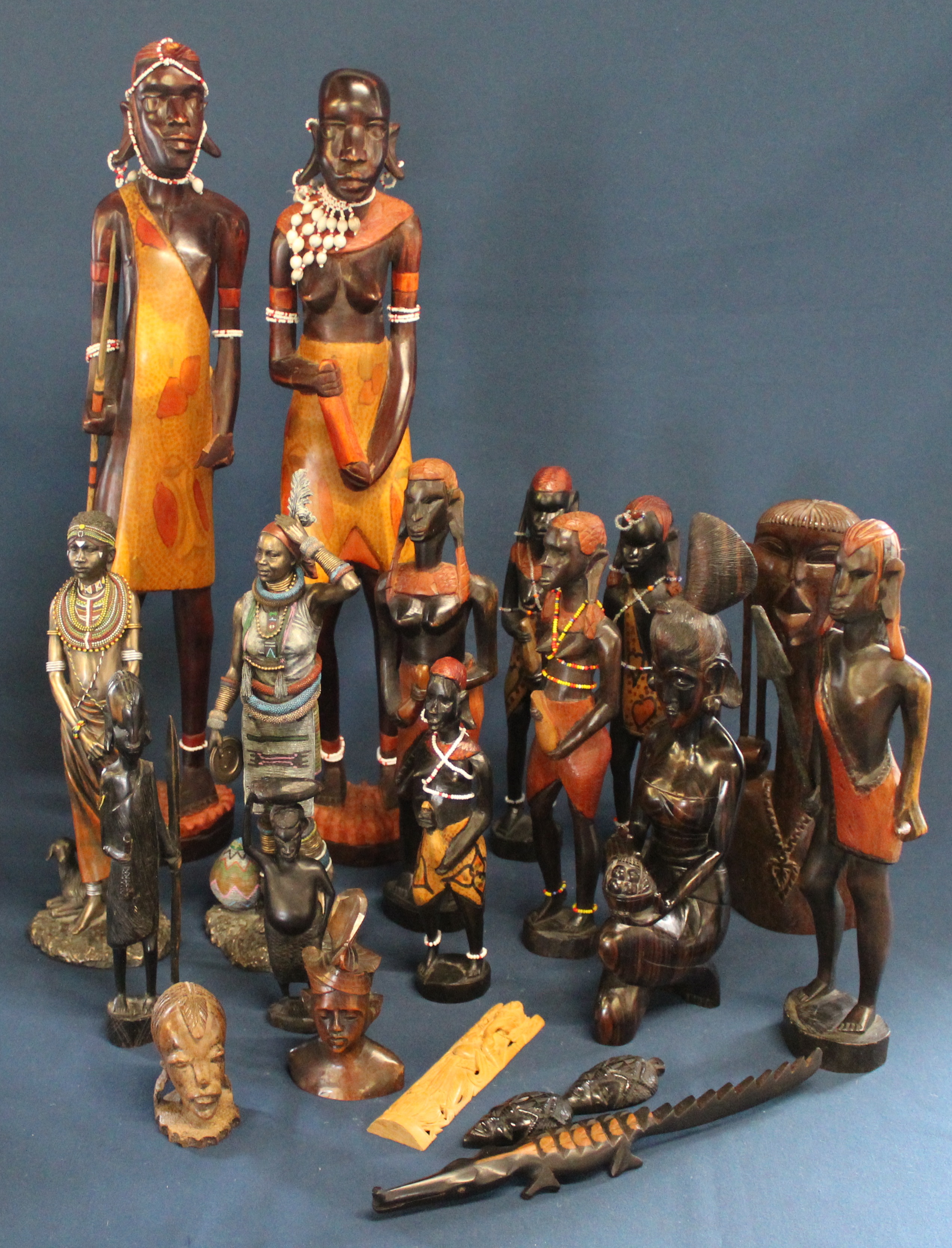 Selection of carved African figures & 2 Veronese resin figures