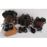 Collection of binoculars includes Oxley field 6.5, Military Regulation and an empty Bausch & Lomb