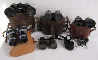 Collection of binoculars includes Oxley field 6.5, Military Regulation and an empty Bausch & Lomb