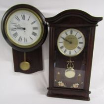 London Clock Co Quartz chiming clock and Towcester Clock Works Co battery (quartz) wall clock