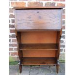 Small oak writing bureau with book shelves