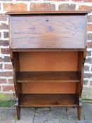 Small oak writing bureau with book shelves