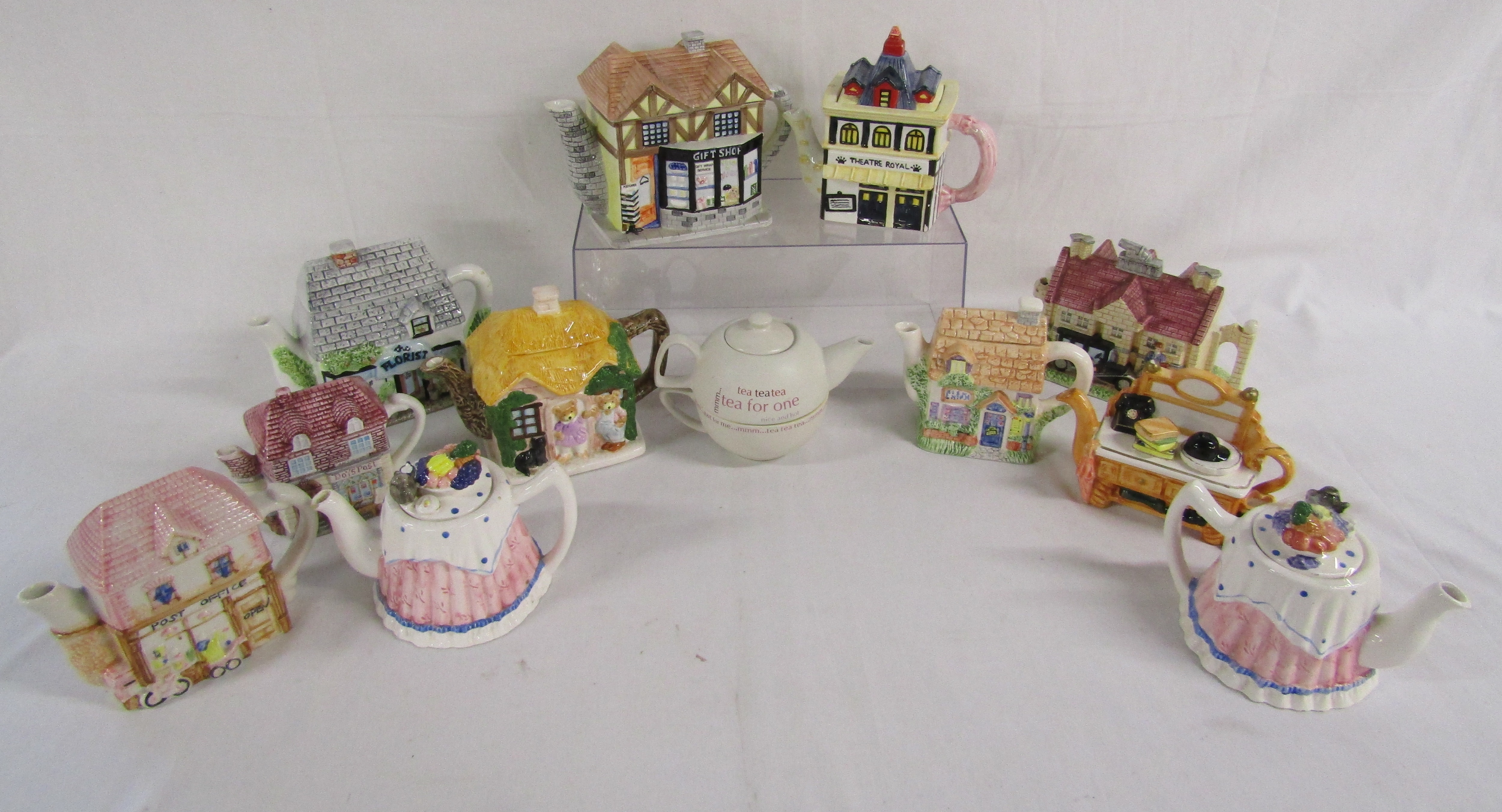 12 teapots includes Leonardo Antiques, theatre royal and country manor, florist, tea for one, The