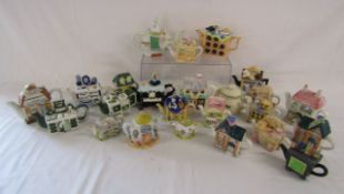 24 small teapots includes Leonardo chicken scene and fruit shop, stoves, cottages elephant with baby