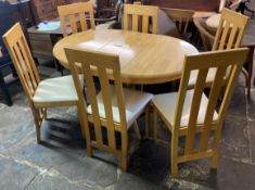 Modern draw leaf dining table extending to 123cm by 90cm with 6 chairs
