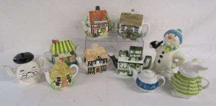 10 teapots include The Village fruit stall, the ship inn, country pub stove, Leonardo George &