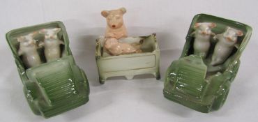 3 German porcelain pig figures - mother with piglet and 2 pigs in a car