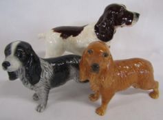 3 Beswick King Charles spaniels, larger liver and white (firing crack to tail) and 2 smaller John
