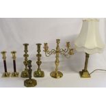 Brass candlesticks, candelabra and lamp
