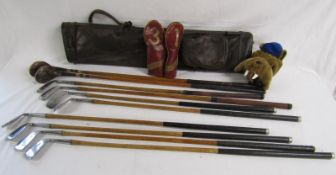 Hickory shafted golf clubs include Carnoustie driver and iron, Tom Marris, Wallasey, Burke irons,