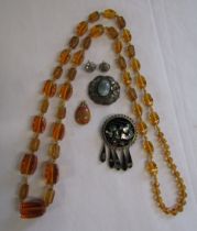 Collection of costume jewellery includes abalone inlaid brooch stamped Mexico, agate pendant, brooch