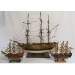 Large wooden model ship and two smaller models H.M.S Bounty and H.M.S Victory ship models