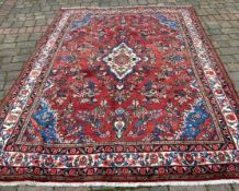 Terracotta ground full pile Persian Sarouk floral medallion design carpet  300cm by 212cm