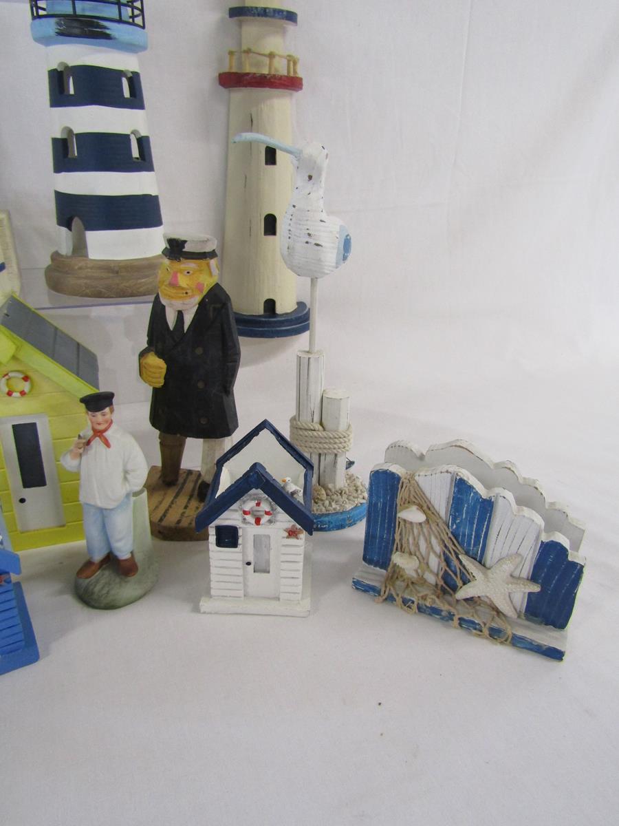 Collection of wooden beach ornaments includes, clock, lighthouses, beach hut money boxes, candle - Image 5 of 8