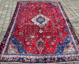 Red ground Persian Najafabad carpet 277cm by 191cm