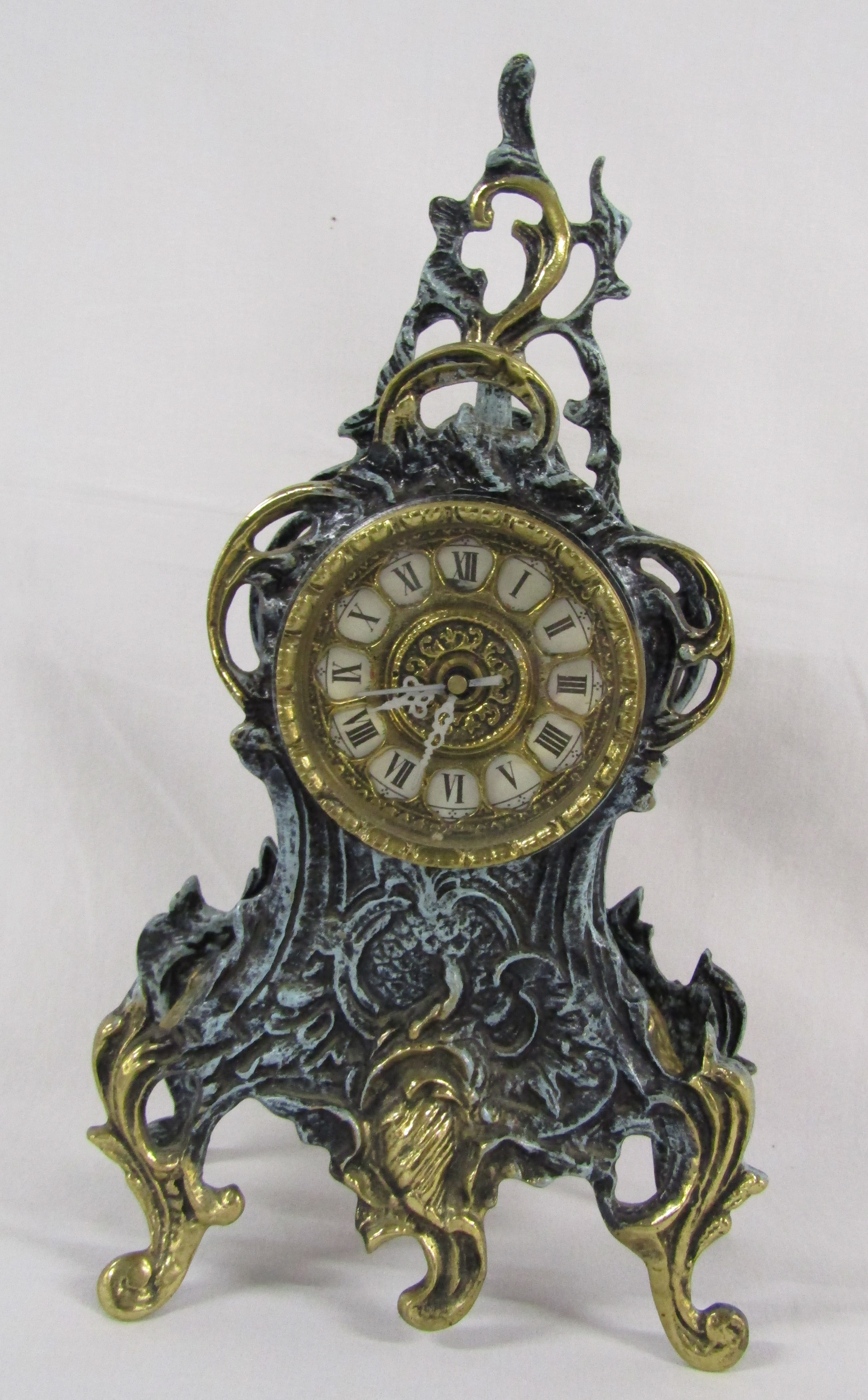 Ornate brass and green mantel clock - battery operated - approx. 34cm tall