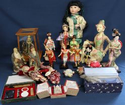 Selection of Chinese costume dolls, pin cushions, replica Terracotta Army figure, writing set , 2