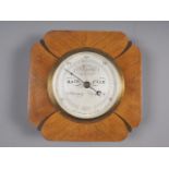 A walnut shaped barometer, 8 3/4" square