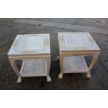 A pair of carved and painted hardwood two-tier lamp tables, on cabriole supports, 20" square x 22"