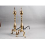 A pair of brass andirons, on scroll supports, 18" high