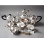 A silver plated four-piece teaset with half fluted decoration, various plated tea wares, cutlery,