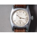 A Helvetia "Unbreakable" chrome cased wristwatch with white enamel dial, Arabic numerals and