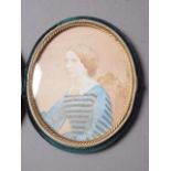 A carved wax portrait cameo of Admiral Nelson, 3 3/4" high, in ebonised frame, and a colour