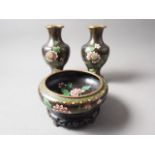 A pair of Chinese cloisonne vases, decorated flowers on a scale ground, 10" high overall, and a