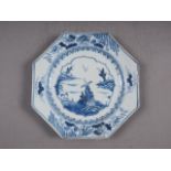 A Chinese blue and white octagonal plate with bird, tree and flower decoration, 8 1/4" dia (chips,