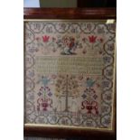 A mid 19th century cross-stitch "Adam and Eve" sampler, by Elizabeth Dovey Aged 12, 1858, 20 1/2"