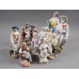 Four porcelain figures, gardeners, two fisherfolk, a Staffordshire bridge group and two other