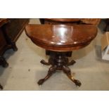 A Victorian burr walnut semicircular fold-over card table, on carved cabriole castored supports, 36"