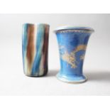 A Wedgwood tapered vase, decorated gold dragon on a powder blue ground, 7" high, and a trefoil-