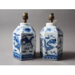 A pair of 19th century Chinese blue and white hexagonal jars with dragon, flaming pearl and flower