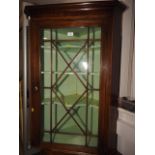 A 19th century mahogany corner hanging cabinet enclosed astragal glazed door, 30" wide x 17" deep