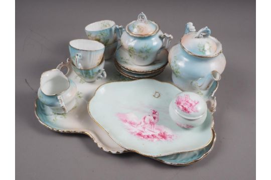 A late 19th century Continental porcelain floral decorated afternoon teaset for four with tray, a