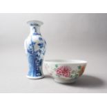 A 19th century Chinese famille rose bowl with floral decoration, 7" dia x 3 1/4" high (restored),