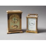 A Mappin and Webb brass cased carriage clock, 5" high, and a Rapport brass cased carriage clock with