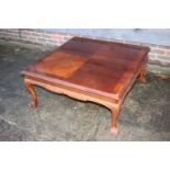 A mahogany and banded low square top coffee table, on carved cabriole claw and ball supports, 38"