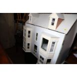 A part finished "Grosvenor" dolls house, 33" wide x 30" high, and basement
