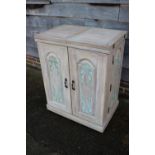 A carved and painted hardwood flap-top cabinet with fitted interior, drawers and cupboards, 30" wide