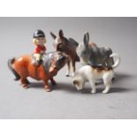 A Beswick model donkey, 4 1/2" high, a model of a Thelwell pony and rider , another Beswick model