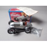 A Schuco Studio model of a Mercedes Grand Prix 1937 with key and tools, boxed