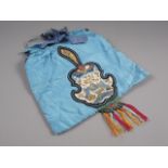 A 1900s Chinese embroidered silk bag "Presented by the Queen"