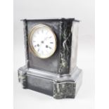 A French late 19th century black slate and marble mantel clock with white enamel dial and Roman