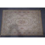 An Aubusson type tapestry panel of Louis XVI design, roses on a cream ground, 70" x 45" approx