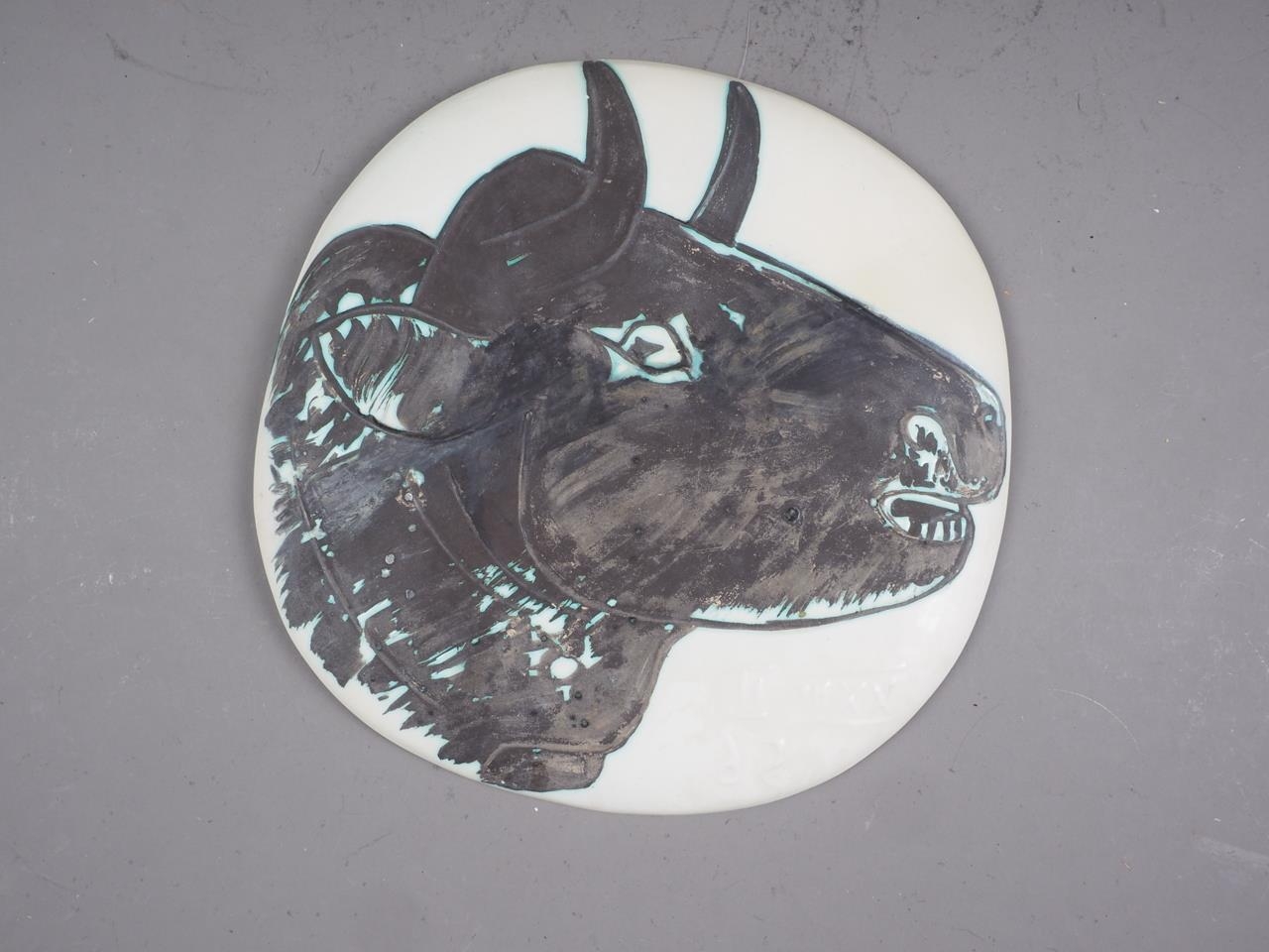 A Pablo Picasso faience plaque, "Profil De Taureau", 1956, 10" dia (plate has been in half and has