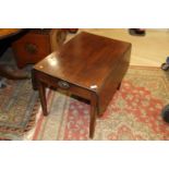 A 19th century mahogany drop leaf table, fitted one drawer, on square taper supports (cut down), 30"