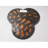 A set of twelve OKA faux tortoiseshell place mats, 9 1/2" dia